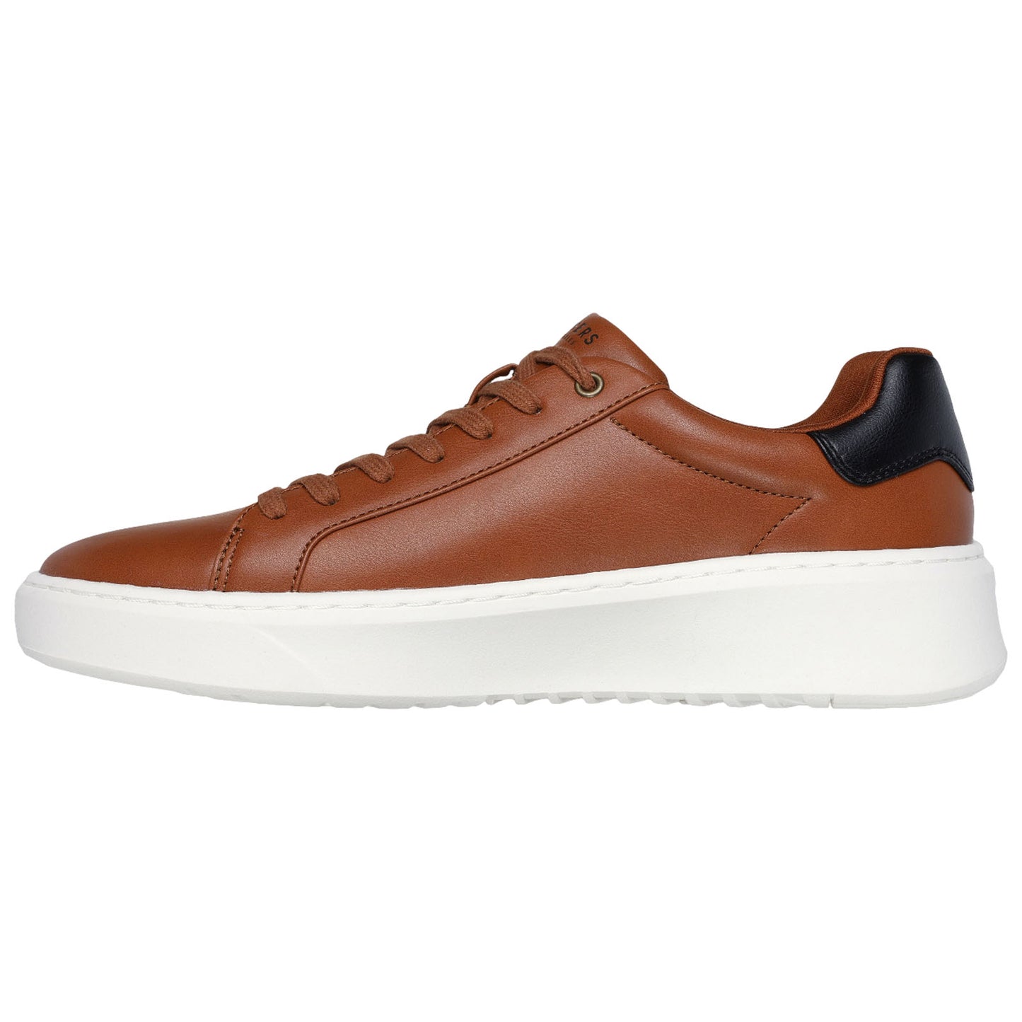 A brown leather sneaker with a white sole is displayed. It features a rounded toe and black accents on the heel, positioned on a plain white background.