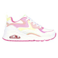 A white sneaker with pink and yellow accents sits on a flat surface featuring a cushioned sole with a visible air unit showcasing a sporty design suitable for casual wear.