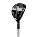 A golf club titled Q10 Max Rescue is displayed upright with a sleek black and silver design featuring a textured grip and markings indicating it is a four hybrid with a loft of 23 degrees