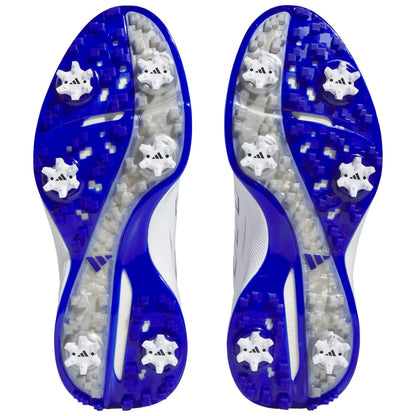 Athletic shoes with a blue and white design are positioned with their soles facing up showing rubber spikes suited for traction on various surfaces intended for sports activities.