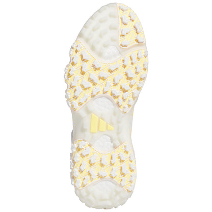 Shoe sole features a textured yellow and white pattern designed for grip and traction while resting on a plain white background. The Adidas logo is visible near the center.