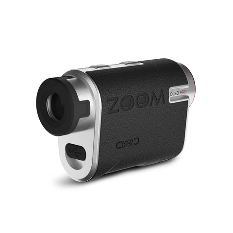 A compact digital device designed for zooming captures distant subjects displaying a sleek black and silver design with visible buttons and branding in a minimalist environment.