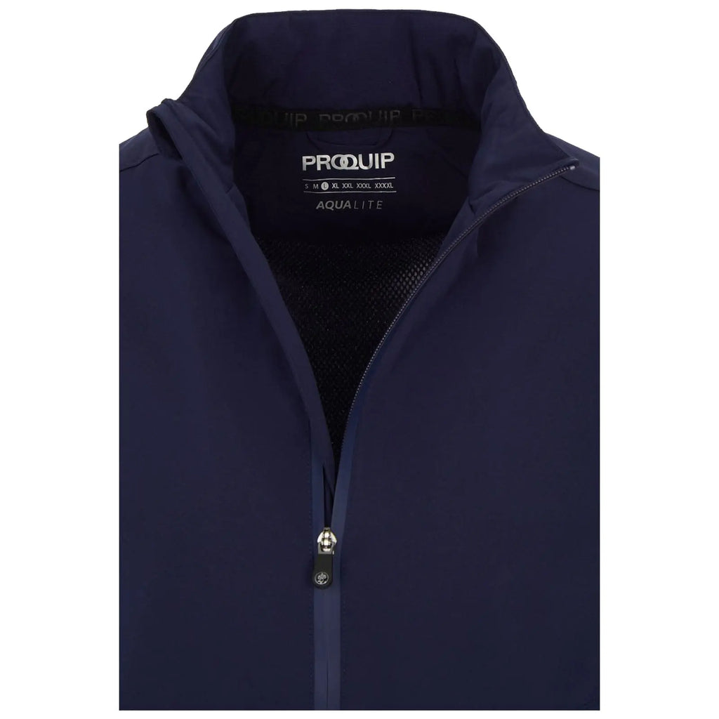 A navy blue jacket features a zippered front and a high collar with a mesh interior. It is lightweight designed for outdoor activities. The label inside displays the brand and size information.