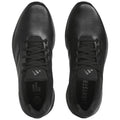Black athletic shoes are displayed from above with laces tied each shoe features a textured surface and branding visible inside including the text END PLASTIC WASTE and LIGHTSTR.