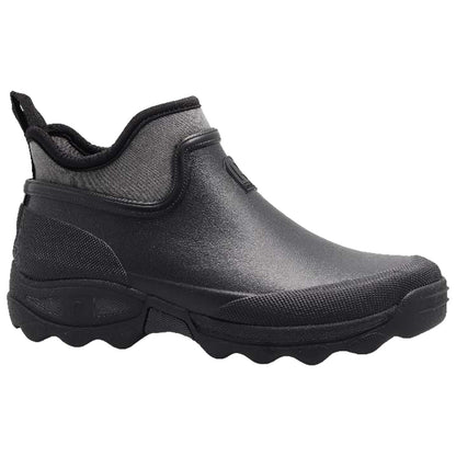 A black ankle boot is displayed standing upright its smooth surface shows a textured sole and a back pull tab for easy wear designed for comfort and practicality in outdoor settings