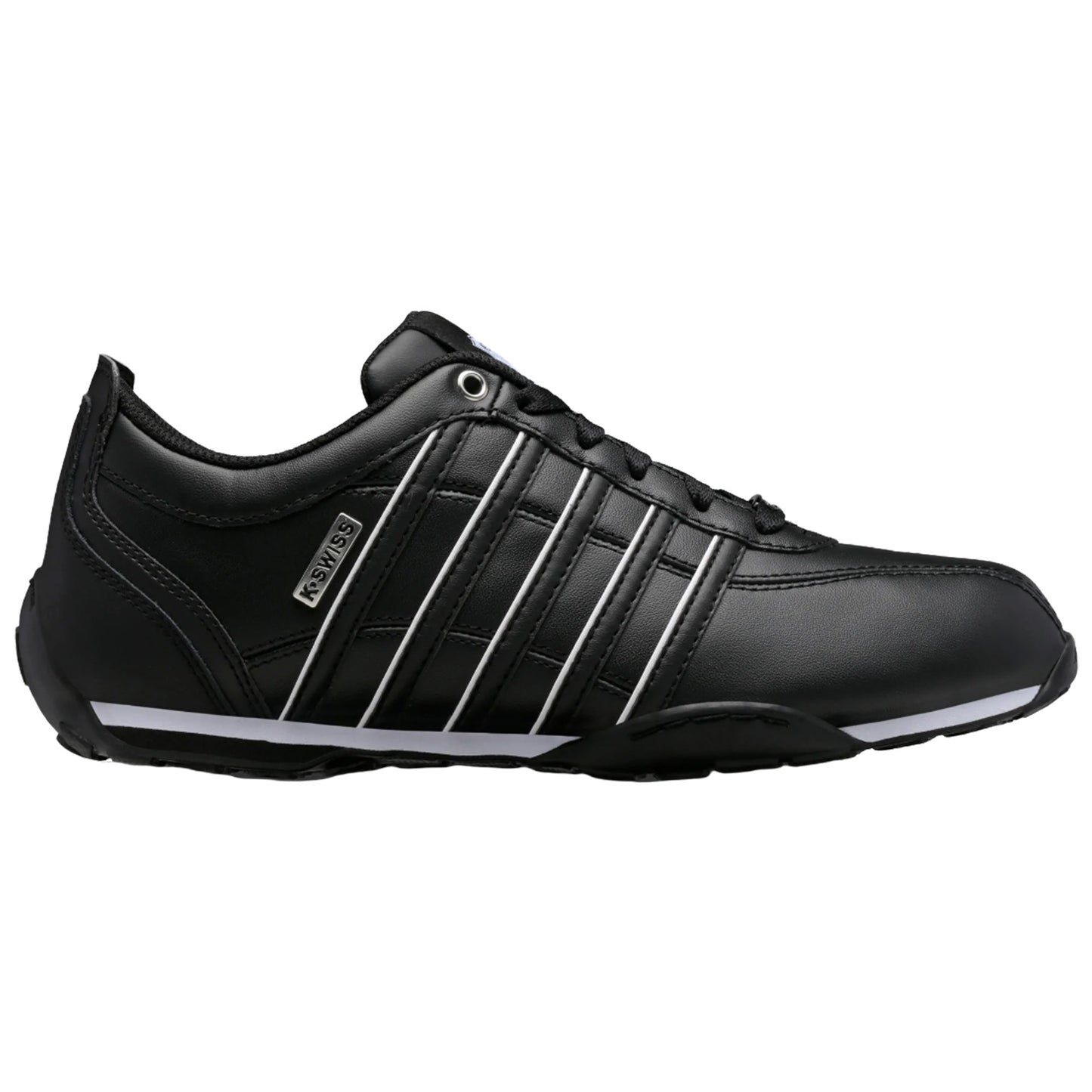 Black athletic shoe features a sleek design with three white stripes on the side and a light sole positioned on a plain background suggesting a focus on footwear for sports or casual wear.