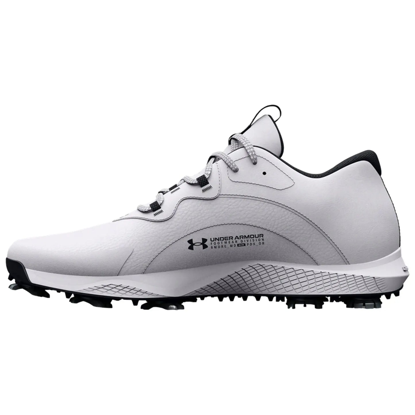 A white golf shoe with black accents is displayed on its side showcasing its design features and textured sole for grip on the course