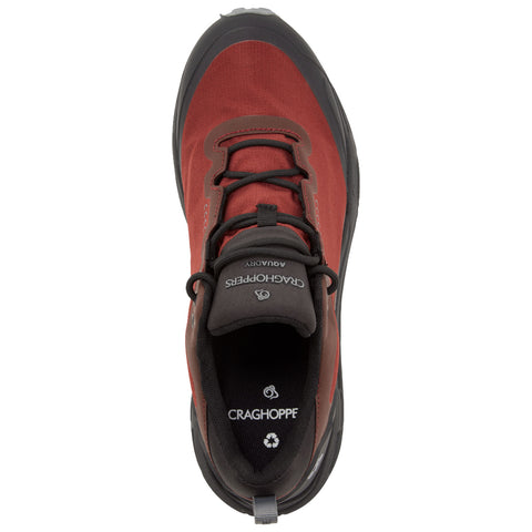 A red outdoor shoe features a textured upper with black accents laces and a cushioned interior. The design is suitable for hiking or casual outdoor activities. The brand logo is visible inside.