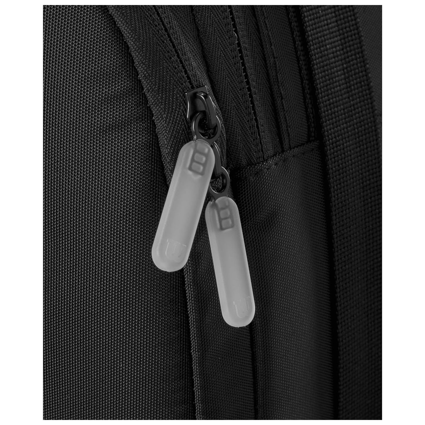 A black backpack with a zipper is partially opened showing gray zipper pulls hanging down the sides in a textured fabric context suggesting durability and utility.