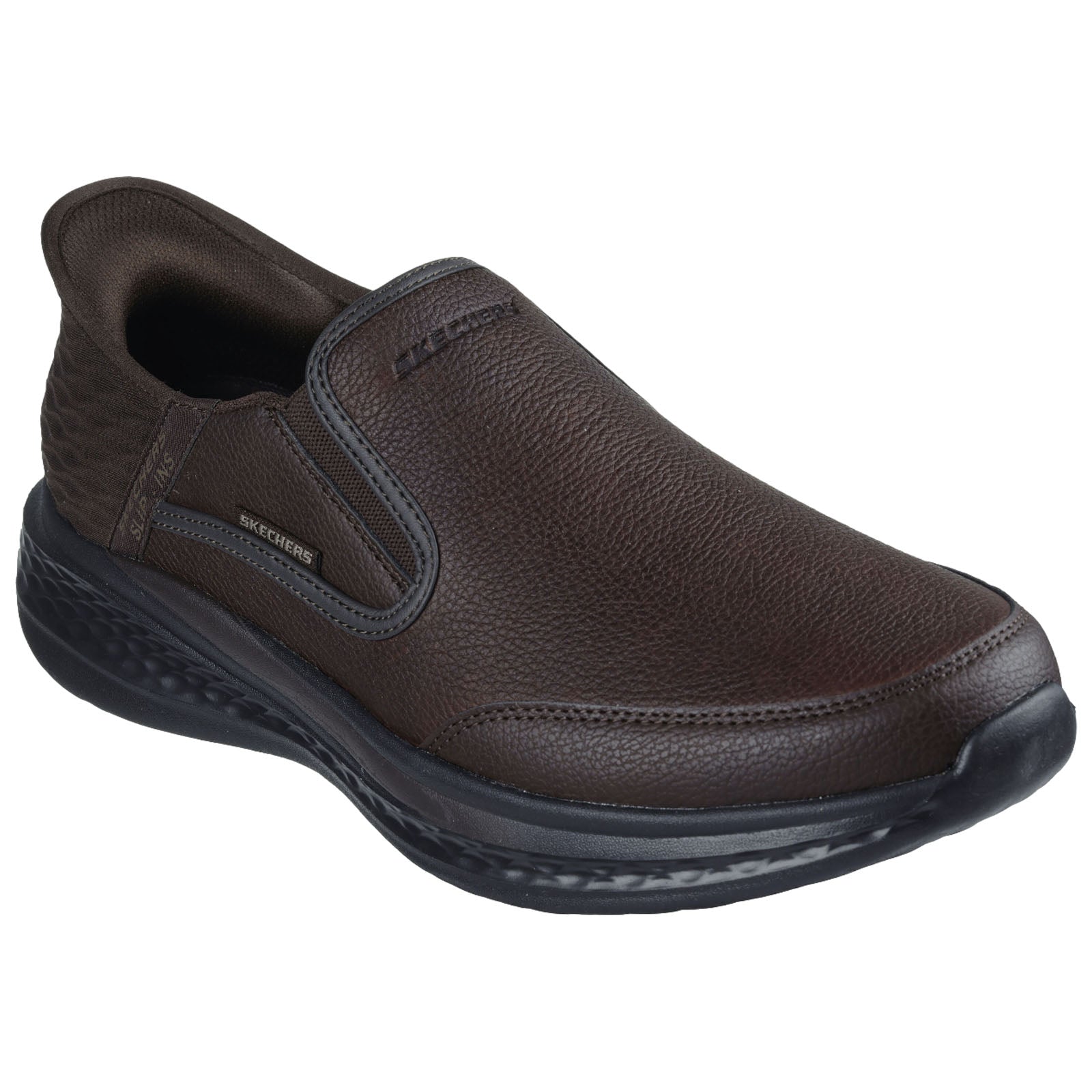 A brown slip-on shoe is displayed prominently the shoe features a textured upper and elastic side panels suggesting comfort and ease of wear against a plain white background.