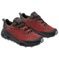 Red and brown hiking shoes are displayed prominently with a rugged design featuring a waterproof layer and textured soles suitable for outdoor activities in varied terrains.