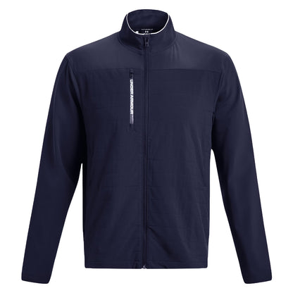 A navy blue jacket is hanging upright showcasing its full zip front and high collar with the brand name prominently displayed on the chest in white text.