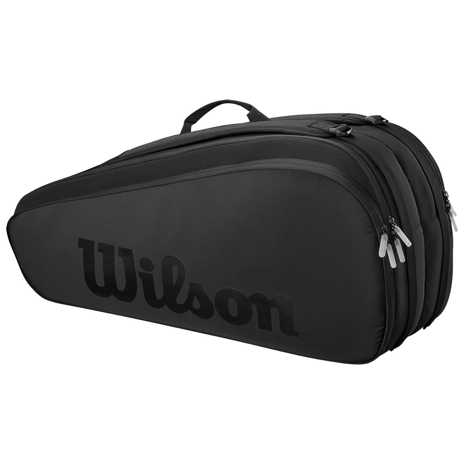 A black sports bag with three zippered compartments prominently displays the logo Wilson while resting on a flat surface indicating it is designed for carrying sports equipment.