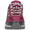 A pink athletic shoe features prominent lacing and a mesh upper for breathability it is positioned against a neutral background showcasing its design and color details.