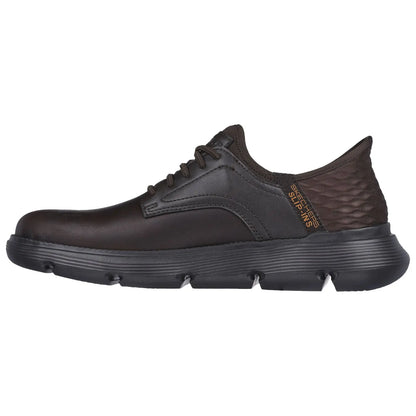 A black sneaker with a smooth leather upper and textured heel key features include laces and a cushioned sole suitable for casual or athletic wear against a plain white background