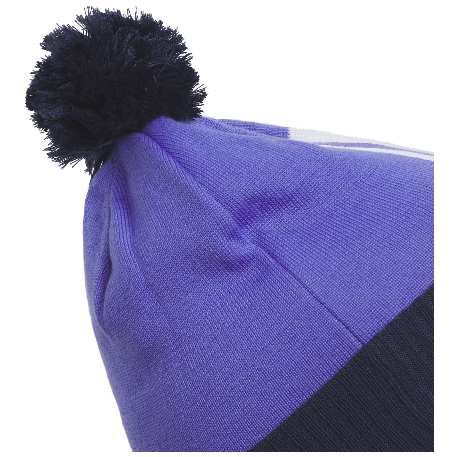 A purple knitted beanie with a black pom-pom on top is positioned sideways against a plain background suggesting a winter accessory designed for warmth and style.