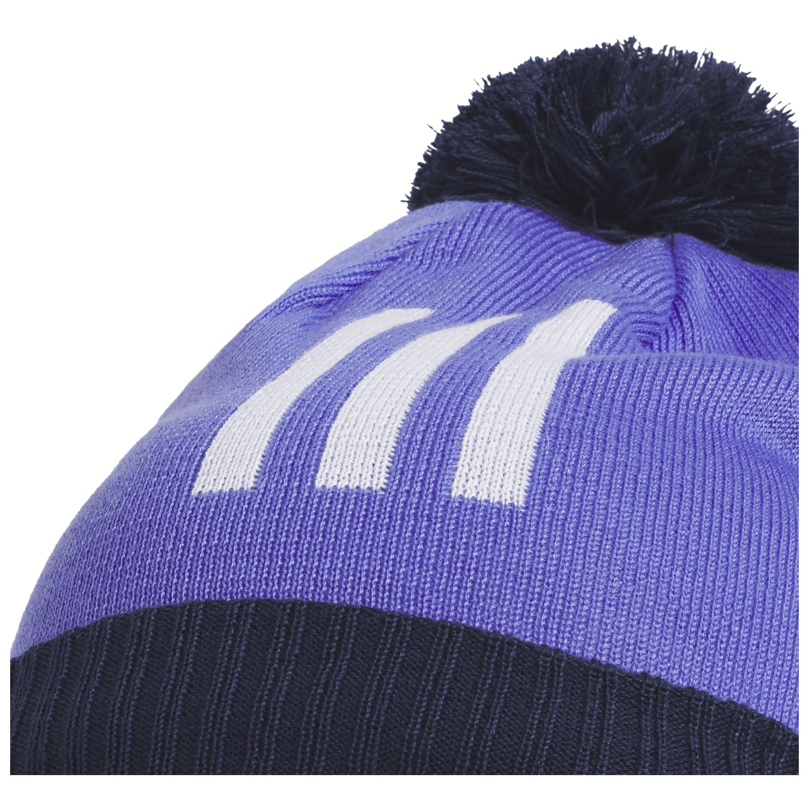A purple knit hat with a black band and a pom-pom on top features three white stripes on one side, designed for warmth in cold weather conditions.