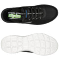 A black athletic shoe with a textured upper and elastic laces rests on a white background showcasing its sole featuring a grid pattern for traction and the brand name Skechers on the insole.