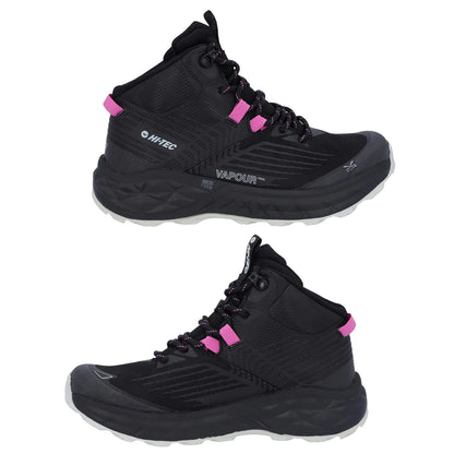 Mid-top black hiking shoes are positioned for display showcasing a rugged design with pink accents laces and textured surfaces suitable for outdoor activities on varied terrains.