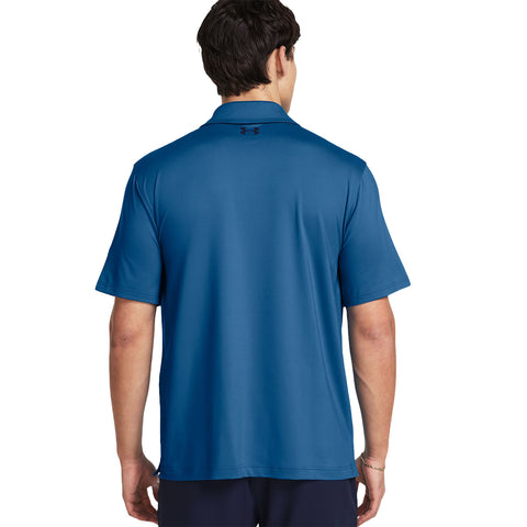 A blue polo shirt is displayed from the back on a person standing upright in a neutral background suggesting a focus on the shirt's color and design.