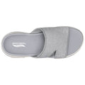 A grey slip-on sandal is displayed with a textured upper and an elastic band. It features comfortable cushioning and an ArchFit insole designed for support and comfort.