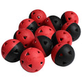 A cluster of rubber balls features a mix of red and black halves with triangular cutouts scattered together on a flat surface, suggesting play or sport-related activity.