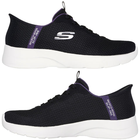 Black athletic shoes with a breathable mesh upper feature purple accents on the heel and laces showcasing a sleek design suitable for casual wear and light exercise.