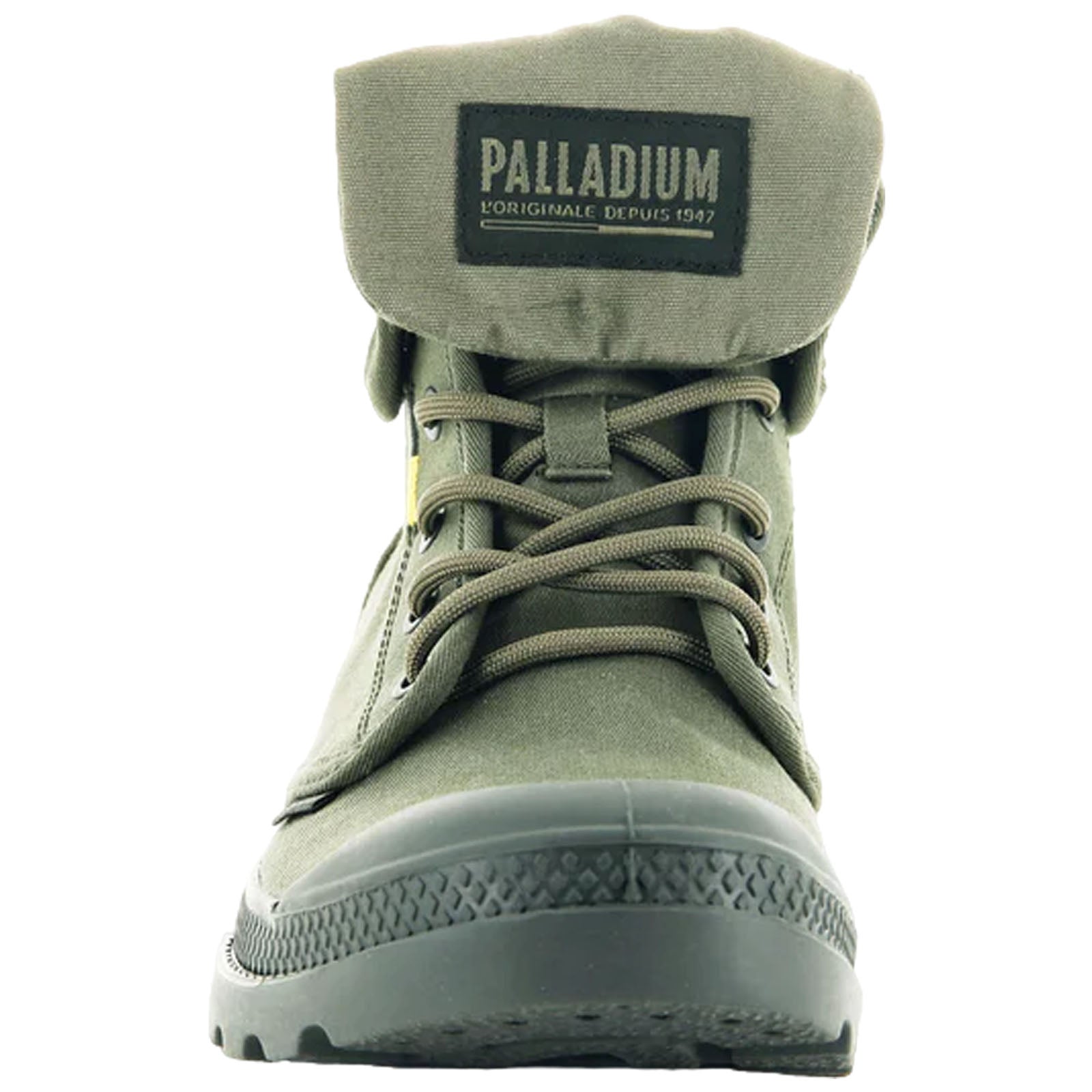 Green high-top boot with a folded cuff features laces and a textured rubber sole displayed against a plain background highlighting its design and branding labeled Palladium.