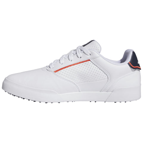 A white athletic shoe is displayed with a smooth leather surface lace-up design and decorative perforations featuring a subtle orange stripe and a black heel tab on a plain background.