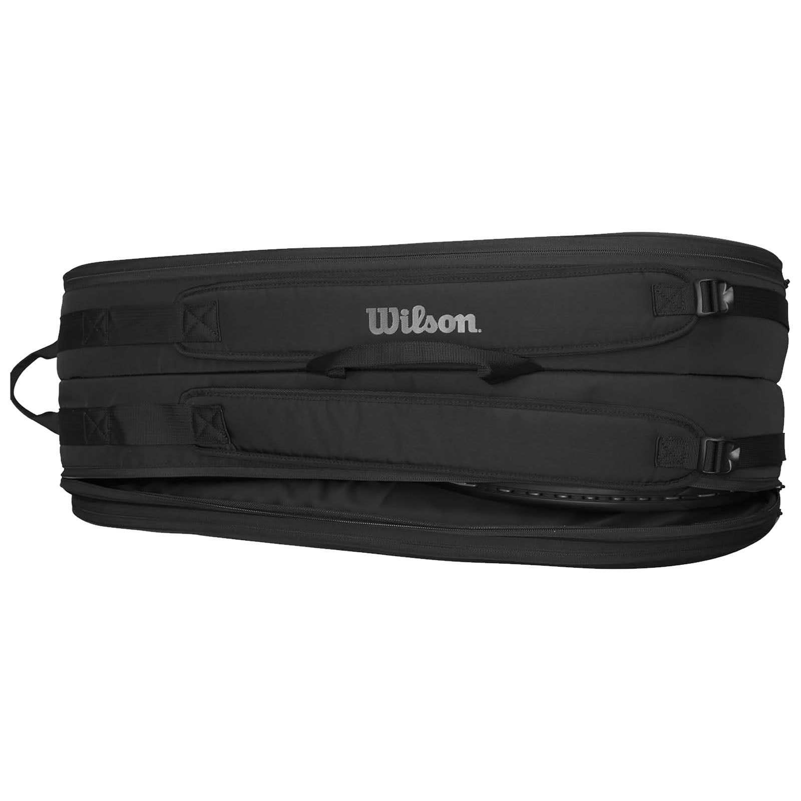 A black tennis bag with multiple compartments holds tennis gear showcasing the Wilson logo while lying flat against a neutral background indicating storage or transport of sports equipment.
