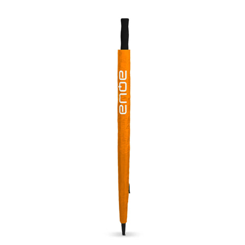 An orange umbrella stands upright with a black handle at the top The surrounding environment is plain white emphasizing the umbrella’s bright color and design