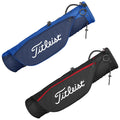 Two golf bags are displayed side by side one in blue with a white Titleist logo and the other in black with a red accent both designed for carrying golf clubs and equipment.