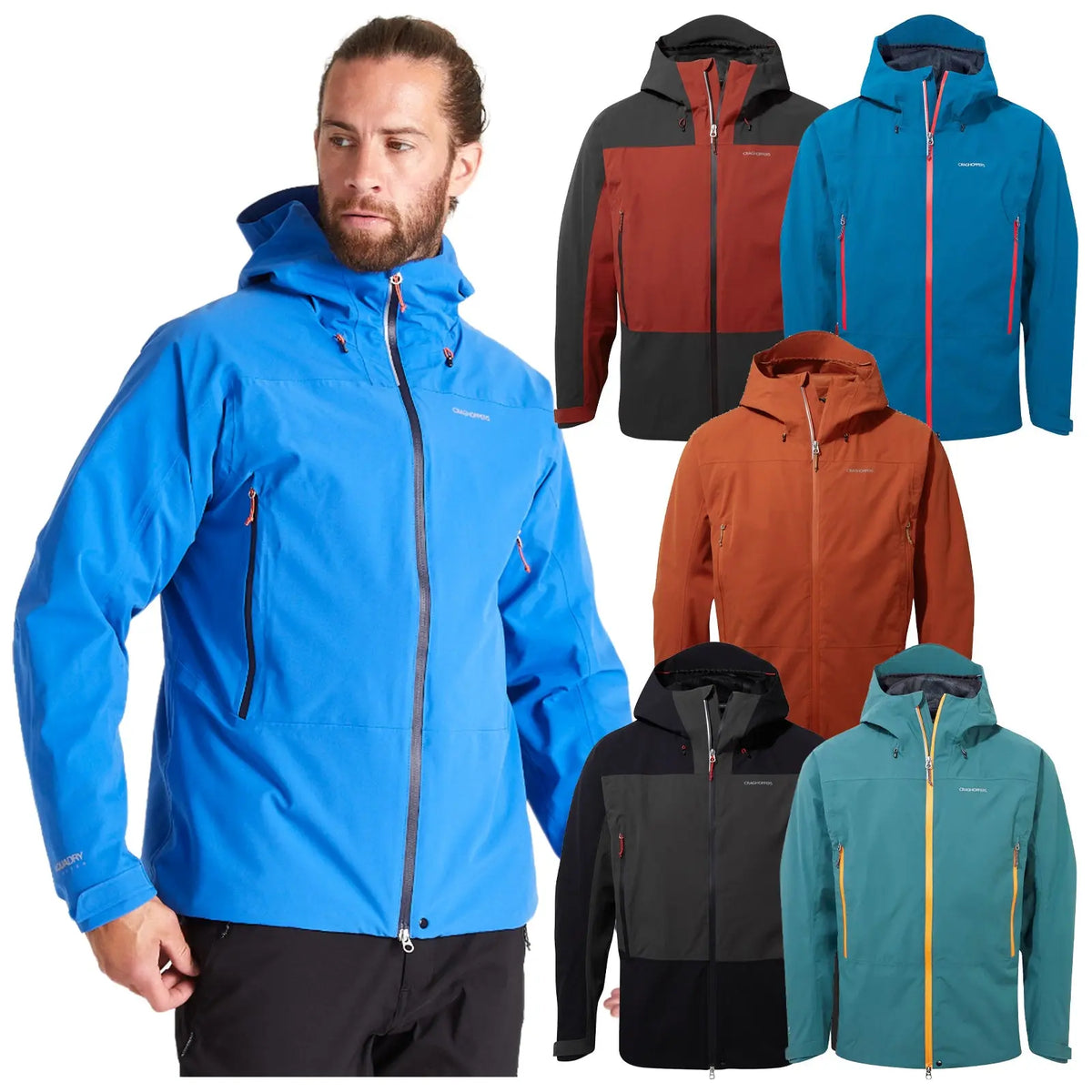 A man wearing a blue jacket stands confidently while several colorful outdoor jackets in shades of orange teal black and a darker blue surround him in the background.