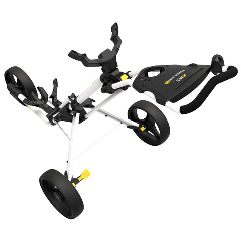 A golf push cart with a folding frame features three wheels and adjustable handles designed for transporting golf bags easily across various terrains in a recreational setting.