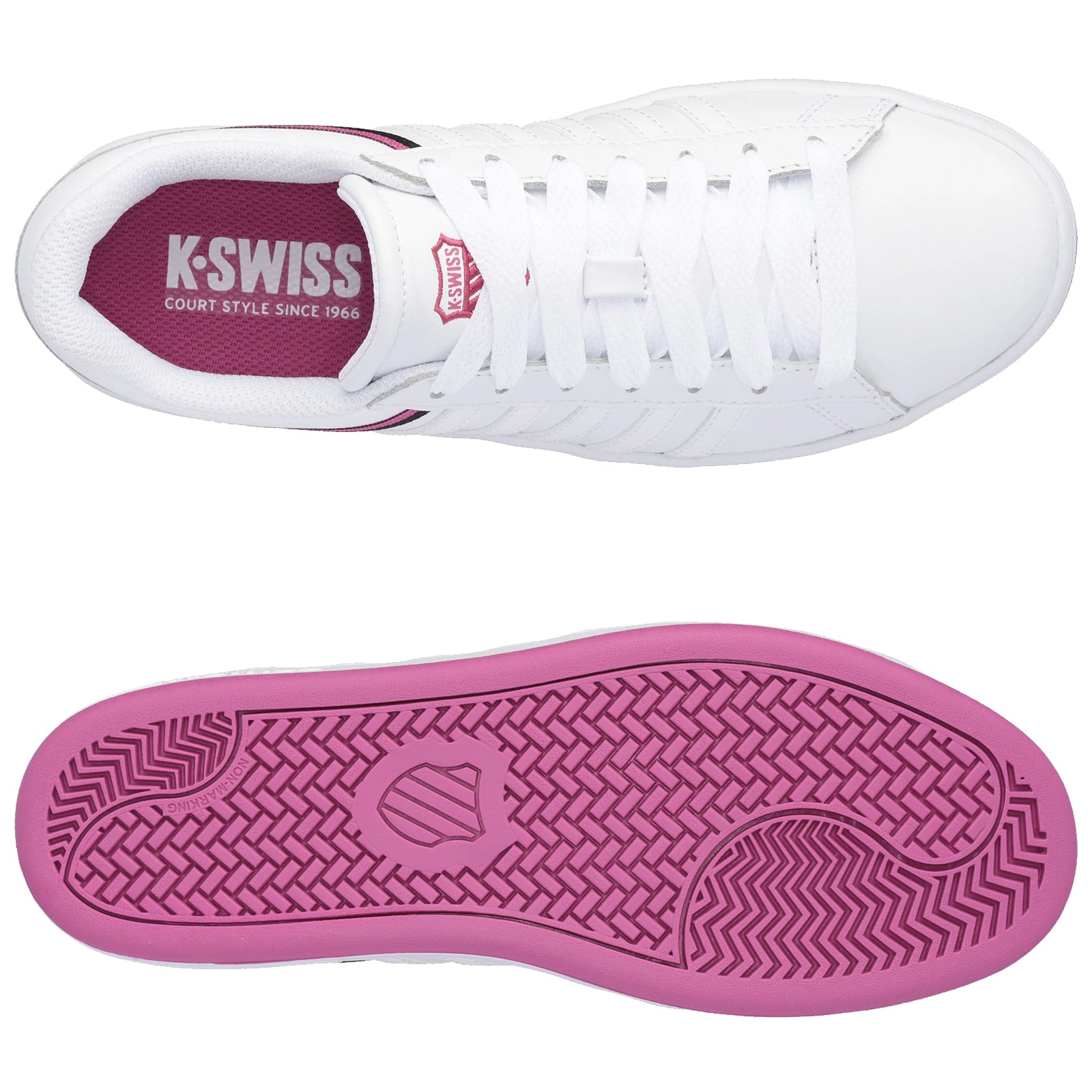 A white sneaker with a textured upper and pink inner lining rests flat. The sole is pink with a patterned tread, indicating purpose for movement and grip. K-Swiss branding is visible.