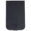 A black leather phone case is positioned upright showcasing its smooth surface and white stitching along the edges with a small logo embossed at the bottom center.