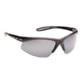 Sunglasses are placed against a plain background featuring a sporty design with dark frames and tinted lenses designed for outdoor use reflecting protection from sunlight and enhancing visibility.