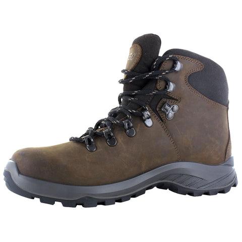 A brown hiking boot stands upright featuring a sturdy sole and metal eyelets for laces designed for outdoor activities and rugged terrains showcasing durability and support for the wearer