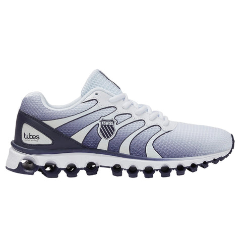 A sports shoe is positioned sideways showcasing a mesh upper in gradient shades of white and blue Its sole features rounded protrusions labeled tubes for enhanced comfort