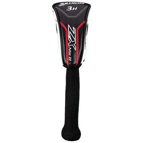 A golf club headcover designed for a hybrid club with a sleek black and white design featuring red accents is resting upright showcasing the brand name Srixon and model ZX MKII.