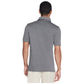A person is shown wearing a short-sleeved gray polo shirt with the view from the back in a simple setting with neutral colors. The focus is on the shirt's style and fit.