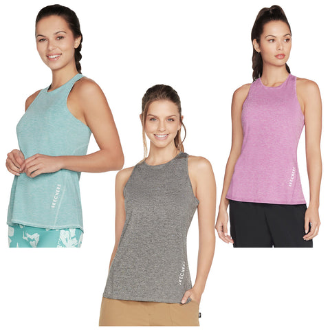 Three women wear athletic tank tops in different colors: turquoise, gray, and pink. They are smiling and posed against a plain white background promoting a casual and active lifestyle.