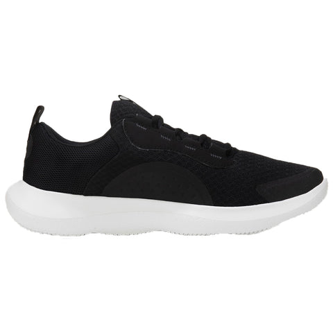 A black athletic shoe with a textured upper and a white sole rests horizontally on a flat surface showcasing its sleek design and comfortable appearance suitable for sports or casual wear.