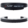 A black practice cup consists of two parts positioned above each other the top part is circular and labeled PURE PRACTICE CUP while the bottom part is a semi-circular base
