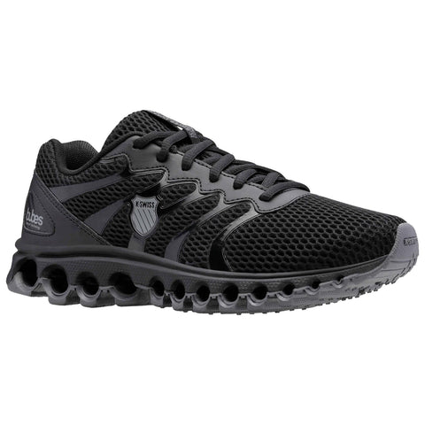 Sporting shoe featuring a black mesh upper with shiny accents and a distinctive cushioned sole designed for comfort and support suitable for running or athletic activities in various environments