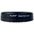 A black practice cup is resting on a flat surface with the word PURE and the phrase PRACTICE CUP displayed clearly on its side. The cup has a textured edge for grip.