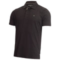 A black polo shirt hangs visibly showcasing its collar short sleeves and a small logo on the chest creating a classic casual look appropriate for various occasions