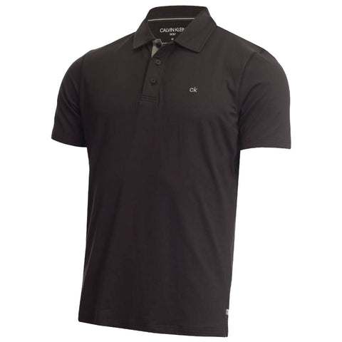 A black polo shirt hangs visibly showcasing its collar short sleeves and a small logo on the chest creating a classic casual look appropriate for various occasions