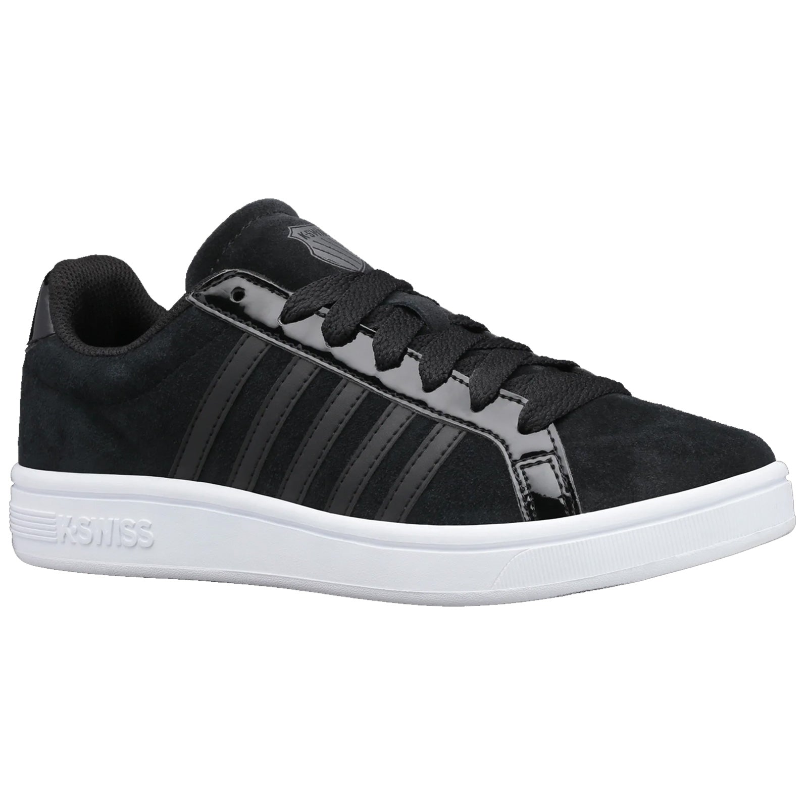 A black athletic shoe sits on a flat surface featuring a suede texture with shiny black stripes and white rubber sole showcasing a modern design suitable for casual wear.