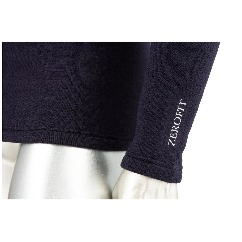 A dark long-sleeve shirt is displayed on a silver mannequin with the brand name Zerofit printed in white on the sleeve highlighting the garment's texture and fit.